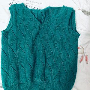 Women's green sweater vest